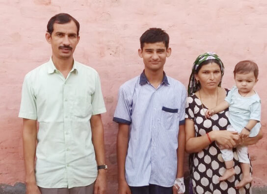 Anshul with his parents and younger sister