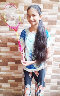 Saniya with her badminton racquet